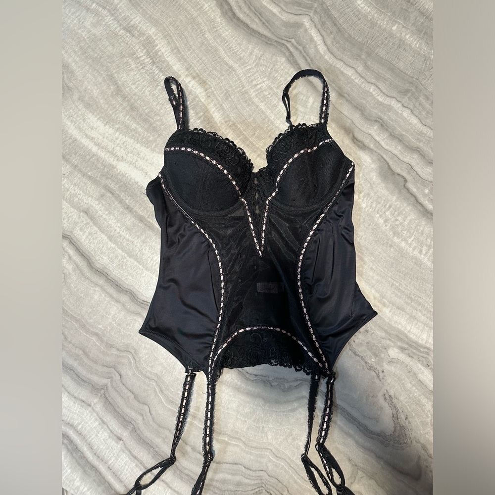 Black mesh and lace corset top with white lace trim
Size 36B